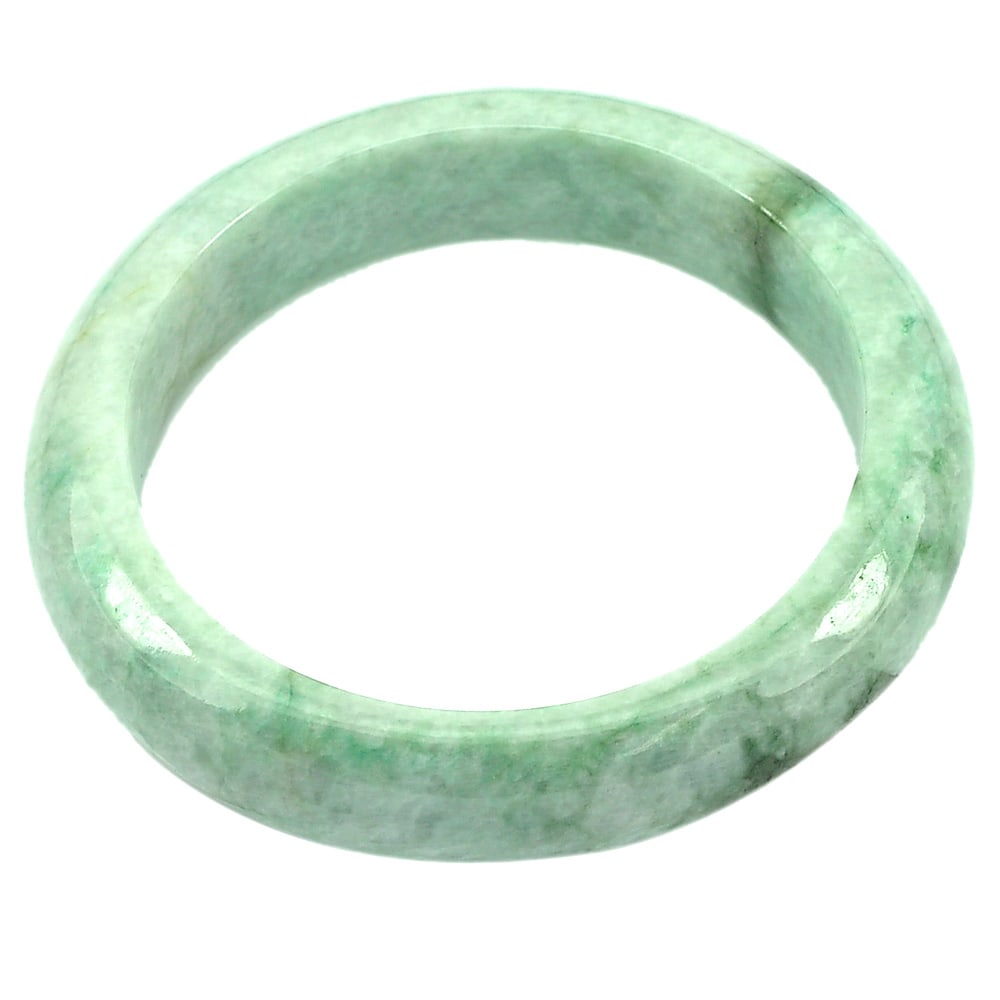 Natural Green Jade Bangle 333.14 Ct. Size 73 x 57 x 14 mm. Gemstone: Product ID: 819813520 Product Name: Natural Jade Weight: 333.14 CT. Size: 73 x 57 x 14 MM. Shape: Round Color: Green Clarity:Opaque Luster: Good Gems Origin: Thailand Treatment: Unheated Crystal Struc