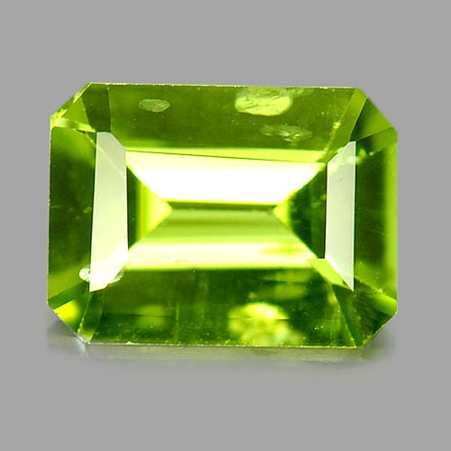 Natural Green Peridot 1.36 Ct. Octagon Shape 8 x 6 Mm. Gemstone Unheated: Product ID: 805313937 Product Name: Natural Peridot Weight: 1.36 CT. Size: 8 x 6 x 3.6 MM. Shape: Octagon Color: Green Clarity:SI1 Luster: Good Gems Origin: Pakistan Treatment: Unheated Crystal Struct