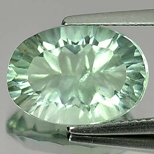 Natural Green Fluorite 7.12 Ct. Oval Concave Cut 14.1 x 10 x 7.3 Mm. Unheated Gemstone: Product ID: 802704348 Product Name: Natural Fluorite Weight: 7.12 CT. Size: 14.1 x 10 x 7.3 MM. Shape: Oval Concave Cut Color: Green Clarity:VSI Luster: Good Gems Origin: Brazil Treatment: Unheated Cr