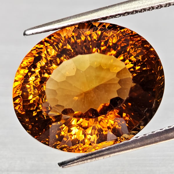 Natural Imperial Topaz 14.10 Ct. Oval Concave Cut 15 x 13.7 Mm Gemstone From Brazil: Product ID: 807168281 Product Name: Natural Topaz Weight: 14.10 CT. Size: 15.5 x 12.8 x 9.5 MM. Shape: Oval Concave Color: Imperial Clarity:VSI Luster: Good Gems Origin: Brazil Treatment: Unheated Cry