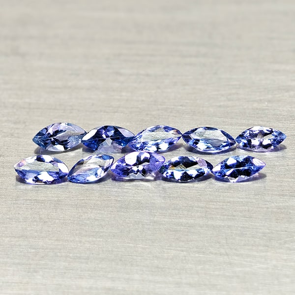 Natural Violetish Blue Tanzanite 1.29 Ct. 10 Pcs. Marquise Shape 5 x 2.4 Mm. Gemstons From Tanzania: Product ID: 807015022 Product Name: Natural Tanzanite Weight: 1.29 CT. Size: 5 x 2.4 x 1.4 MM. Shape: Marquise Shape Color: Violetish Blue Clarity:VSI Luster: Good Gems Origin: Tanzania Treatment: Unh