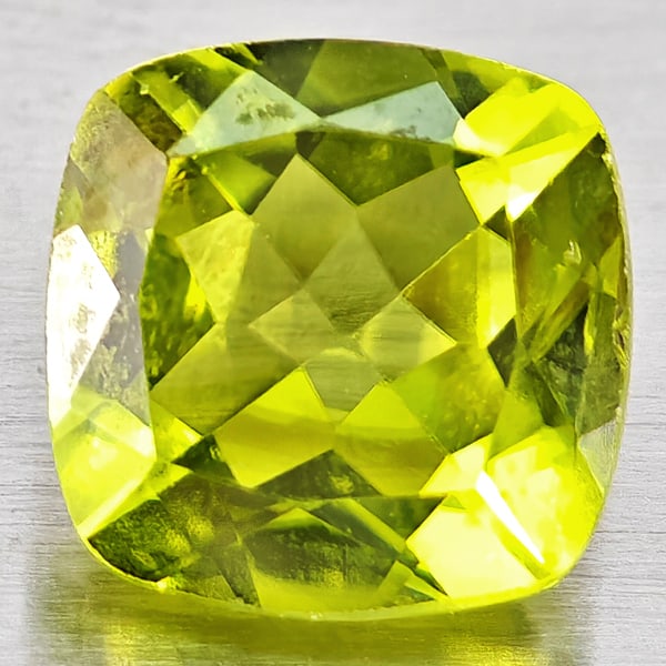 Natural Green Peridot 1.12 Ct. Cushion Shape 6.1 Mm Gemstones From Pakistan: Product ID: 805317352 Product Name: Natural Peridot Weight: 1.12 CT. Size: 6.1 x 6.1 x 3.7 MM. Shape: Cushion Shape Color: Green Clarity:VSI Luster: Good Gems Origin: Pakistan Treatment: Unheated Crys