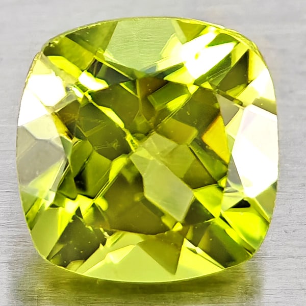 Natural Green Peridot 0.97 Ct. Cushion Shape 5.8 Mm Gemstones From Pakistan: Product ID: 805317355 Product Name: Natural Peridot Weight: 0.97 CT. Size: 5.8 x 5.8 x 3.9 MM. Shape: Cushion Shape Color: Green Clarity:VSI Luster: Good Gems Origin: Pakistan Treatment: Unheated Crys