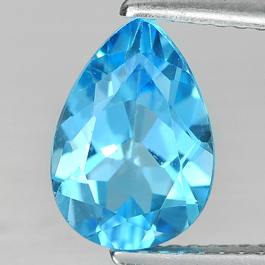 Natural Swiss Blue Topaz 2.17 Ct. Pear Shape 10.1 x 7 Mm. Gemstone From Brazil: Product ID: 807162814 Product Name: Natural Blue Topaz Weight: 2.17 CT. Size: 10.1 x 7 x 4.4 MM. Shape: Pear Color: Blue Clarity:VSI Luster: Good Gems Origin: Brazil Treatment: Treated Crystal Structu