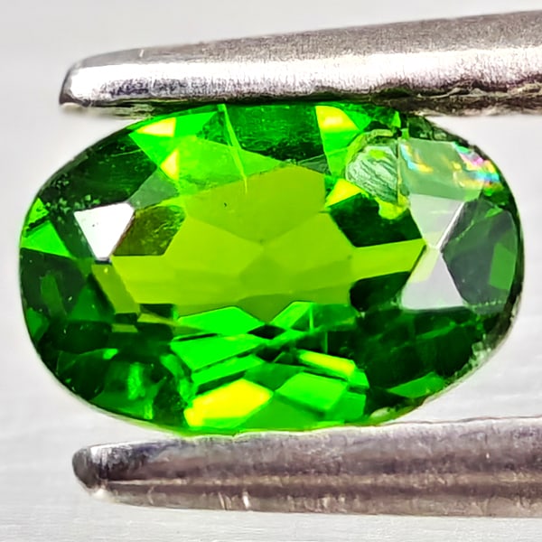 Natural Green Chrome Diopside 0.52 Ct. Oval Shape 6.1 x 4.1 Mm Gemstone From Russia: Product ID: 801608195 Product Name: Natural Chrome Diopside Weight: 0.52 CT. Size: 6.1 x 4.1 x 2.7 MM. Shape: Oval Color: Green Clarity:VSI - SI1 Luster: Good Gems Origin: Russia Treatment: Unheated C