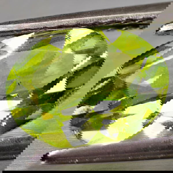 Natural Green Peridot 1.61 Ct. VVS Oval Shape 9 x 7 Mm. Gemstone From Thailand: Product ID: 105302014 Product Name: Natural Peridot Weight: 1.61 CT. Size: 9 x 7 x 3.7 MM. Shape: Oval Color: Green Clarity:VVS Luster: Good Gems Origin: Thailand Treatment: Unheated Crystal Structure