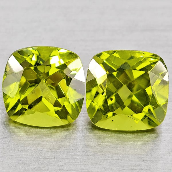 Natural Green Peridot 2.20 Ct. 2 Pcs Cushion Shape 6 Mm. Gemstones From Pakistan: Product ID: 805317412 Product Name: Natural Peridot Weight: 2.20 CT. Size: 6 x 6 x 4.3 MM. Shape: Cushion Shape Color: Green Clarity:VSI Luster: Good Gems Origin: Pakistan Treatment: Unheated Crystal