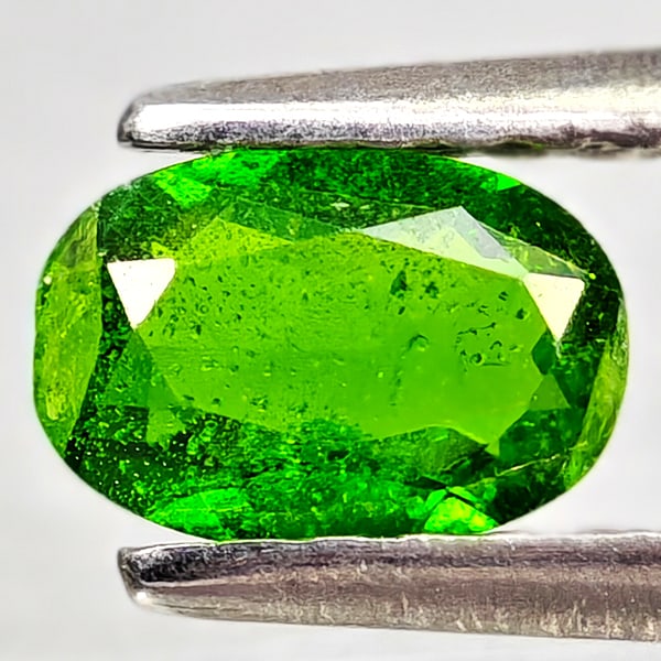Natural Green Chrome Diopside 0.48 Ct. Oval Shape 6 x 4.1 Mm Gemstone From Russia: Product ID: 801608163 Product Name: Natural Chrome Diopside Weight: 0.48 CT. Size: 6 x 4.1 x 2.3 MM. Shape: Oval Color: Green Clarity:VSI - SI1 Luster: Good Gems Origin: Russia Treatment: Unheated Cry