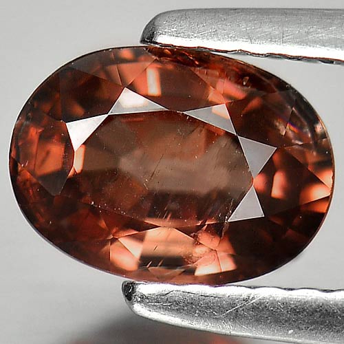 Natural Imperial Pink Zircon 1.49 Ct. Oval Shape 7.5 x 5.4 Mm. Gemstone Unheated From Tanzania: Product ID: 807722938 Product Name: Natural Zircon Weight: 1.49 CT. Size: 7.5 x 5.4 x 3.4 MM. Shape: Oval Color: Imperial Pink Clarity:SI Luster: Good Gems Origin: Tanzania Treatment: Unheated Crystal