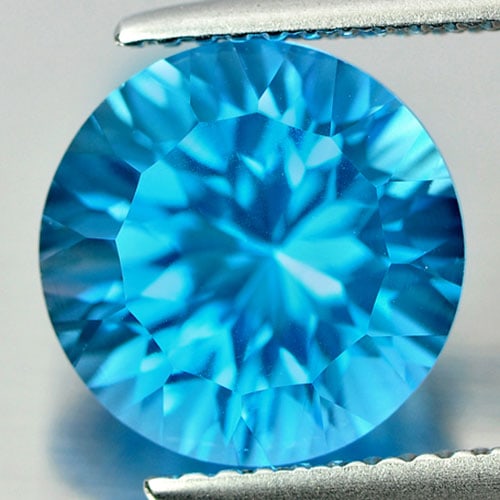 Natural Swiss Blue Topaz 4.51 Ct. Clean Round Cornflower Cut Shape 10 Mm. Gemstone From Brazil: Product ID: 807165840 Product Name: Natural Blue Topaz Weight: 4.51 CT. Size: 10 x 10 x 6.7 MM. Shape: Round Cornflower Cut Color: Blue Clarity:IF Luster: Very Good Gems Origin: Brazil Treatment: Trea