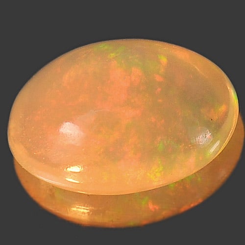 Natural Multi Color Opal 0.88 Ct. Oval Cabochon Shape 8.5 x 6.4 Mm. Gemstone Unheated: Product ID: 818726091 Product Name: Natural Opal Weight: 0.88 CT. Size: 8.5 x 6.4 x 3.6 MM. Shape: Oval Cabochon Color: Multi Color Clarity:Opaque Luster: Iridescent Gems Origin: Ethiopia Treatment: U
