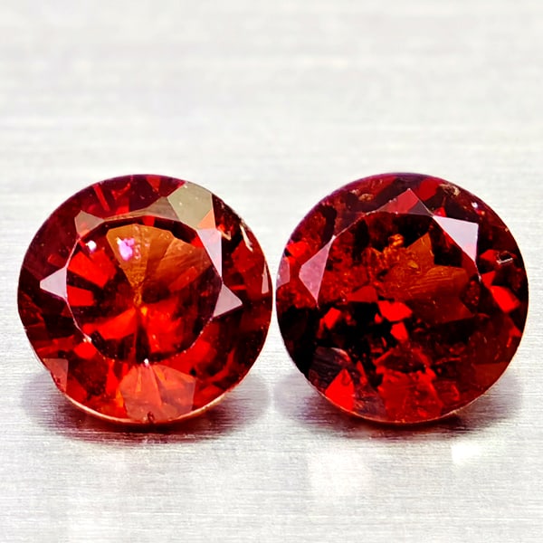 Natural Orangish Red Garnet 1.24 Ct. 2 Pcs Round Shape 5 Mm Gemstones From Tanzania: Product ID: 802936703 Product Name: Natural Red Garnet Weight: 1.24 CT. Size: 5 x 5 x 3.1 MM. Shape: Round Shape Color: Orangish Red Clarity:VSI - SI1 Luster: Good Gems Origin: Tanzania Treatment: Unh