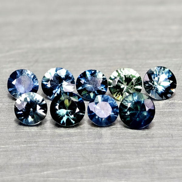 Natural Fancy Color Sapphire 0.51 Ct. 9 Pcs Round Diamand Cut 2.5 to 1.3 Mm Gemstones From Tanzania: Product ID: 806162287 Product Name: Natural Green Sapphire Weight: 0.51 CT. Size: 2.5 x 2.5 x 1.7 to 2.2 x 2.2 x 1.3 MM. Shape: Round Diamond Cut Color: Fancy Color Clarity:VSI Luster: Very Good Gems 