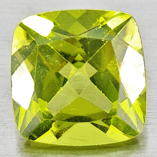Natural Green Peridot 1.09 Ct. Cushion Shape 6.2 Mm Gemstones From Pakistan: Product ID: 805317348 Product Name: Natural Peridot Weight: 1.09 CT. Size: 6.2 x 6.2 x 3.8 MM. Shape: Cushion Shape Color: Green Clarity:VSI Luster: Good Gems Origin: Pakistan Treatment: Unheated Crys