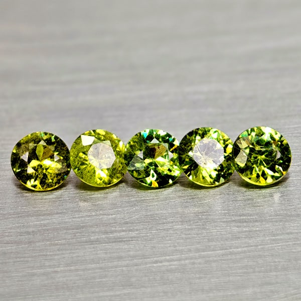 Natural Yellowish Green Demantoid Garnet 0.82 Ct. 5 Pcs Round Diamond Cut 3.3 Mm Gemstones: Product ID: 802936570 Product Name: Natural Demantoid Weight: 0.82 CT. Size: 3.3 x 3.3 x 2.1 MM. Shape: Round Diamond Cut Color: Yellowish Green Clarity:VSI Luster: Good Gems Origin: Madagascar Treatm