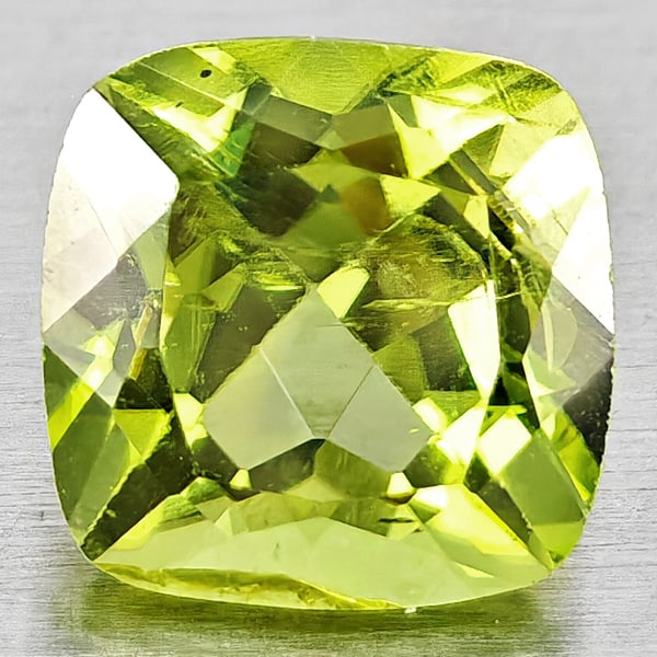 Natural Green Peridot 1.10 Ct. Cushion Shape 6 Mm Gemstones From Pakistan: Product ID: 805317349 Product Name: Natural Peridot Weight: 1.10 CT. Size: 6 x 6 x 4.3 MM. Shape: Cushion Shape Color: Green Clarity:VSI Luster: Good Gems Origin: Pakistan Treatment: Unheated Crystal