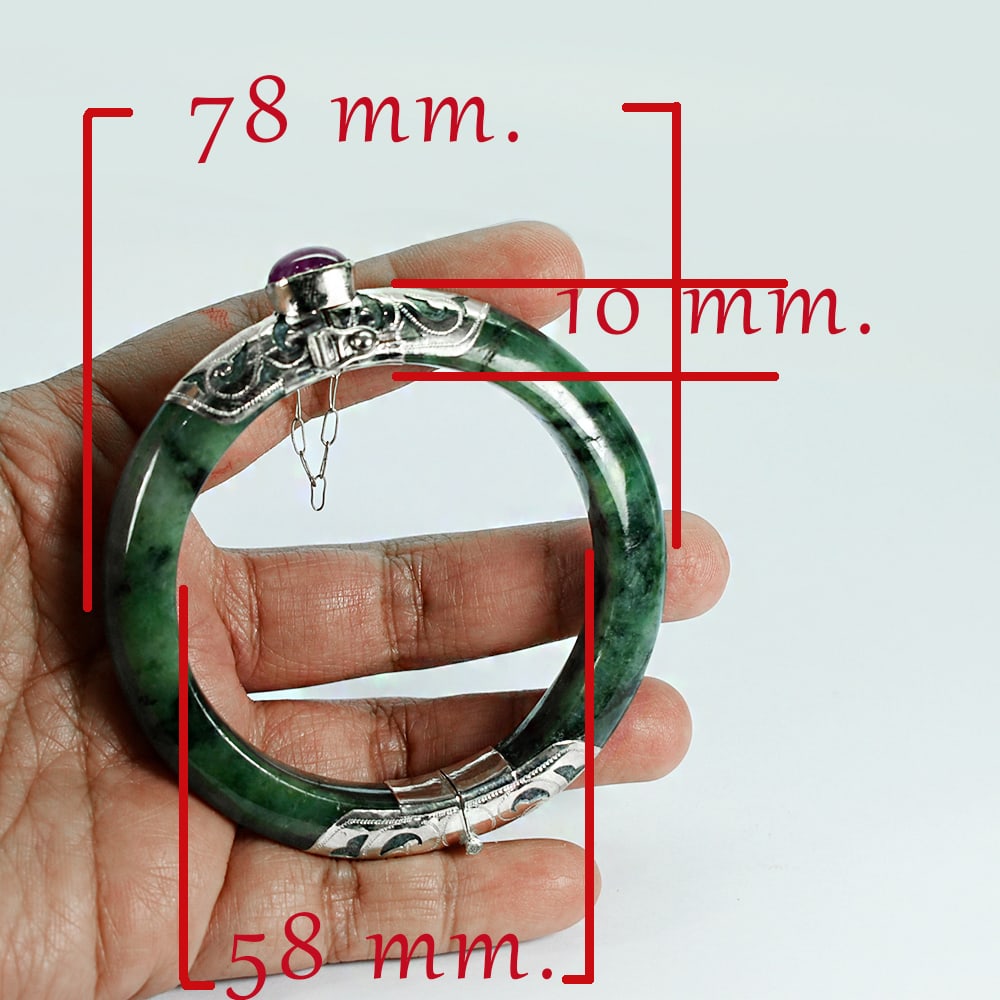 Natural Green Jade 350.70 Ct. Bangle Diameter 58 Mm. With Silver Jewelry Gemstone: Product ID: 818102469 Product Name: Natural Gemstones Weight: 350.70 CT. Size: 78 x 58 x 10 MM. Shape: None Color: Green Clarity:Opaque Luster: Good Gems Origin: Burma Treatment: Unheated Crystal Stru