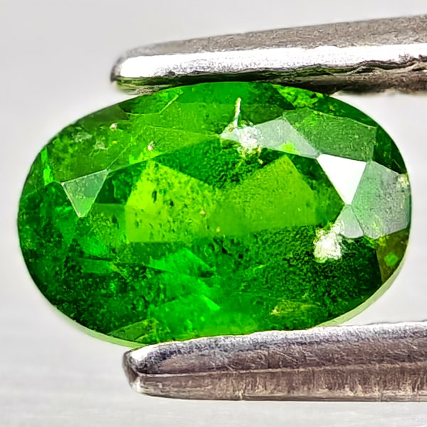 Natural Green Chrome Diopside 0.67 Ct. Oval Shape 6.2 x 4.2 Mm Gemstone From Russia: Product ID: 801608202 Product Name: Natural Chrome Diopside Weight: 0.67 CT. Size: 6.2 x 4.2 x 3.3 MM. Shape: Oval Color: Green Clarity:VSI - SI1 Luster: Good Gems Origin: Russia Treatment: Unheated C