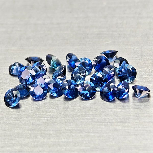 Natural Blue Sapphire 1.51 Ct. 25 Pcs Round Diamond Cut 2.4 Mm Gemstones From Madagascar: Product ID: 806012173 Product Name: Natural Blue Sapphire Weight: 1.51 CT. Size: 2.4 x 2.4 x 1.6 MM. Shape: Round Diamond Cut Color: Blue Clarity:VSI Luster: Good Gems Origin: Madagascar Treatment: He