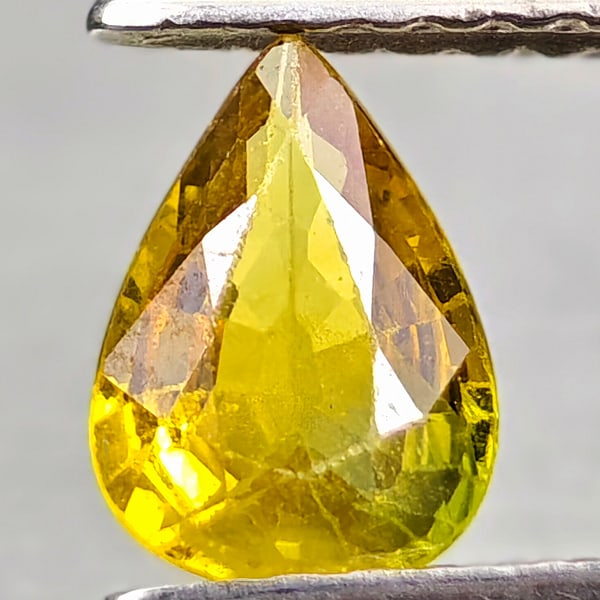 Natural Yellow Sapphire 0.67 Ct. Pear Shape 6.9 x 4.9 Mm Gemstone From Thailand: Product ID: 806162595 Product Name: Natural Yellow Sapphire Weight: 0.67 CT. Size: 6.9 x 4.9 x 2.5 MM. Shape: Pear Shape Color: Yellow Clarity:VSI - SI1 Luster: Good Gems Origin: Thailand Treatment: T