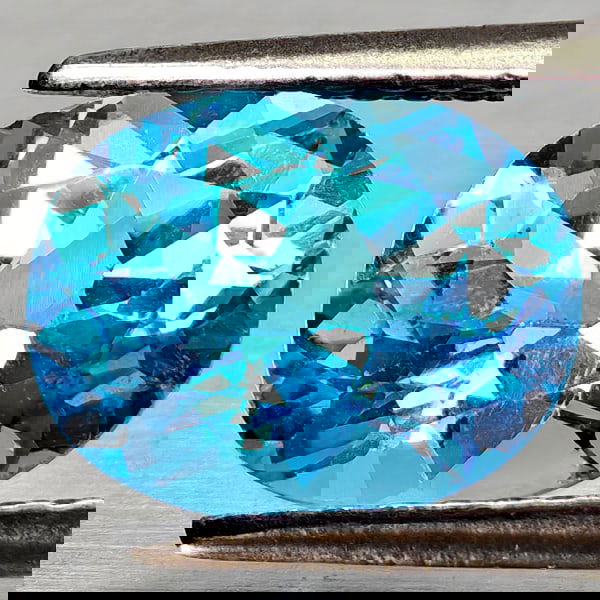 Natural Swiss Blue Topaz 2.44 Ct. Oval Shape 9.2 x 7.3 Mm Gemstone From Brazil: Product ID: 807168154 Product Name: Natural Blue Topaz Weight: 2.44 CT. Size: 9.2 x 7.3 x 4.9 MM. Shape: Oval Shape Color: Swiss Blue Clarity:VVS - VSI Luster: Good Gems Origin: Brazil Treatment: Trea