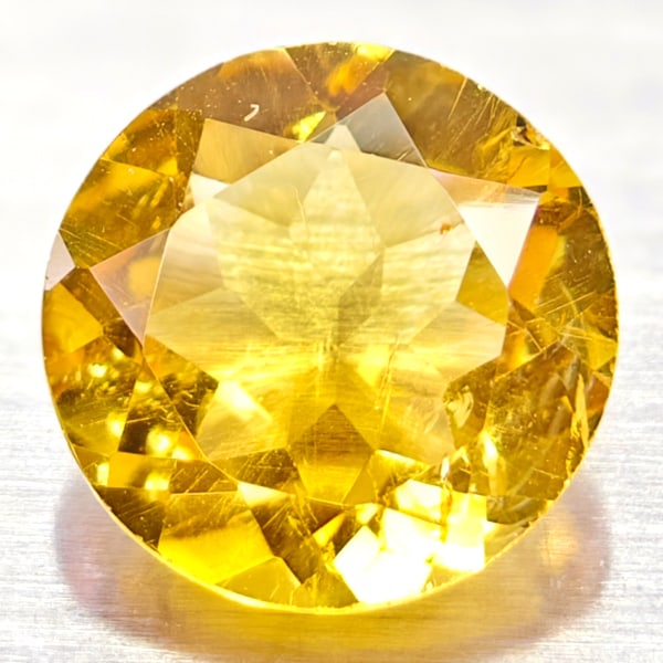 Natural Yellow Citrine 1.01 Ct. VVS Round Shape 7 Mm. Unheated Gemstone: Product ID: 801813573 Product Name: Natural Citrine Weight: 1.01 CT. Size: 7 x 7 x 3.5 MM. Shape: Round Color: yellow Clarity:VVS Luster: Good Gems Origin: Barzil Treatment: Unheated Crystal Structure