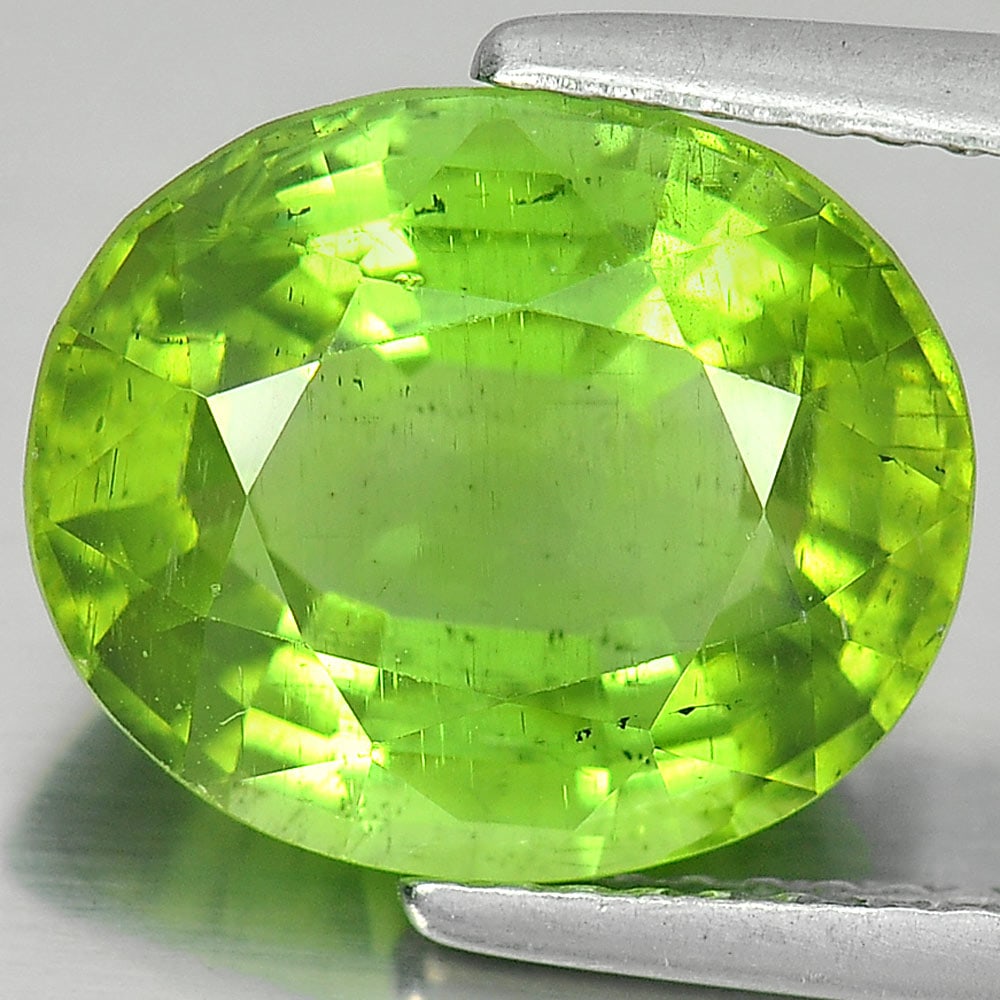 Natural Green Peridot 4.74 Ct. Oval Shape 11.5 x 9.7 Mm. Gemstone Unheated: Product ID: 805307428 / Product Name: Natural Peridot / Weight: 4.74 CT. / Size: 11.5 x 9.7 x 5.9 MM. / Shape: Oval / Color: Green / Clarity:SI1 / Luster: Good / Gems Origin: Thailand / Treatment: Unh