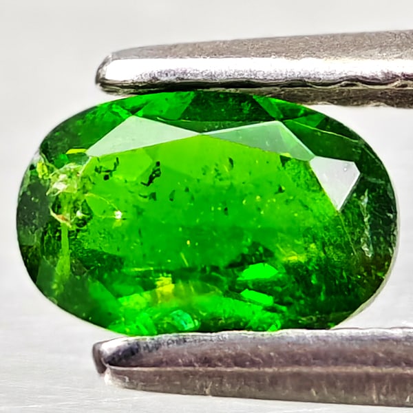 Natural Green Chrome Diopside 0.48 Ct. Oval Shape 6 x 4.1 Mm Gemstone From Russia: Product ID: 801608189 Product Name: Natural Chrome Diopside Weight: 0.48 CT. Size: 6 x 4.1 x 2.3 MM. Shape: Oval Color: Green Clarity:VSI - SI1 Luster: Good Gems Origin: Russia Treatment: Unheated Cry