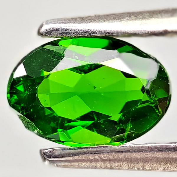 Natural Green Chrome Diopside 0.49 Ct. Oval Shape 6.1 x 4.1 Mm Gemstone From Russia: Product ID: 801608187 Product Name: Natural Chrome Diopside Weight: 0.49 CT. Size: 6.1 x 4.1 x 2.6 MM. Shape: Oval Color: Green Clarity:VSI - SI1 Luster: Good Gems Origin: Russia Treatment: Unheated C