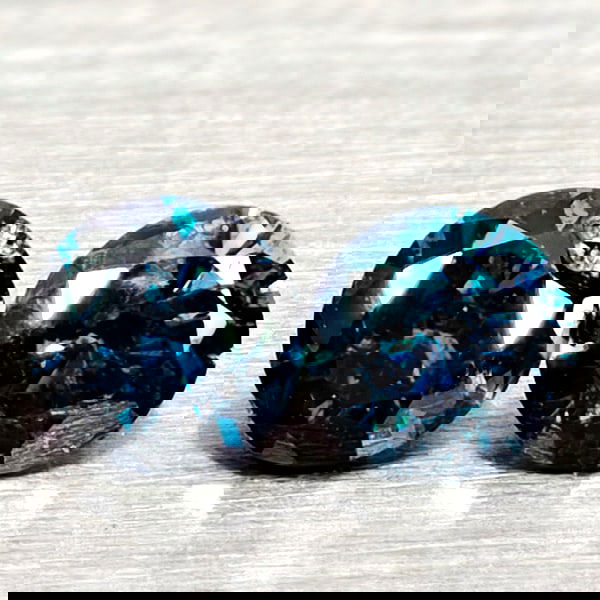 Natural Blue Loose Diamond 0.12 Ct. 2 Pcs Round Diamond Cut 2.5 Mm From Belgium: Product ID: 502100369 Product Name: Natural Natural Diamond Weight: 0.12 CT. Size: 2.5 x 2.5 x 1.6 MM. Shape: Round Diamond Cut Color: Blue Clarity:SI1 Luster: Good Gems Origin: Belgium Treatment: Tre