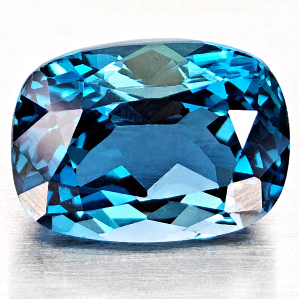 Natural London Blue Topaz 4.00 Ct. Cushion Shape 10.1 x 7.5 Mm Gemstone From Brazil: Product ID: 807168335 Product Name: Natural Blue Topaz Weight: 4.00 CT. Size: 10.1 x 7.5 x 6.3 MM. Shape: Cushion Shape Color: London Blue Clarity:VVS - VSI Luster: Good Gems Origin: Brazil Treatment: