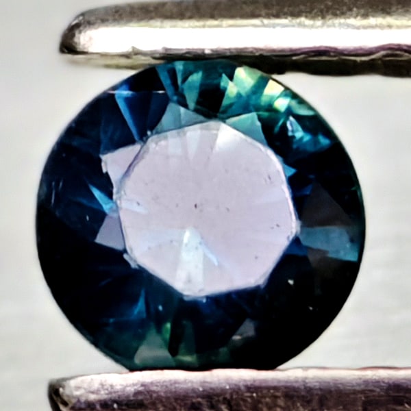 Natural Greenish Blue Sapphire 0.27 Ct. Round Diamand Cut 3.9 Mm Gemstones From Tanzania: Product ID: 806162187 Product Name: Natural Green Sapphire Weight: 0.27 CT. Size: 3.9 x 3.9 x 2.5 MM. Shape: Round Diamond Cut Color: Fancy Color Clarity:VSI Luster: Very Good Gems Origin: Tanzania Tr