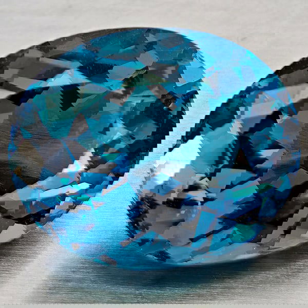 Natural London Blue Topaz 4.58 Ct. Oval Shape 11 x 9 Mm Gemstone From Brazil: Product ID: 807168390 Product Name: Natural Blue Topaz Weight: 4.58 CT. Size: 11 x 9 x 6 MM. Shape: Oval Shape Color: London Blue Clarity:VVS - VSI Luster: Good Gems Origin: Brazil Treatment: Treated