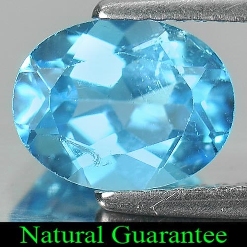 Natural Swiss Blue Topaz 2.23 Ct. Oval Shape 9 x 7 Mm Gemstone From Brazil: Product ID: 807161348 Product Name: Natural Blue Topaz Weight: 2.23 CT. Size: 9 x 7 x 4.6 MM. Shape: Oval Color: Swiss Blue Clarity:VSI Luster: Good Gems Origin: Brazil Treatment: Treated Crystal Stru