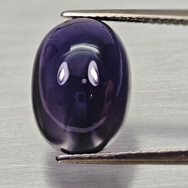 Natural Blue Diffusion Sapphire 8.46 Ct. Oval Cabochon Shape 14.7 x 10.5 Mm Gemstone: Product ID: 806012003 Product Name: Natural Blue Sapphire Weight: 8.46 CT. Size: 14.7 x 10.5 x 7.5 MM. Shape: Oval Cabochon Color: Blue Clarity:Opaque Luster: Good Gems Origin: Madagascar Treatment: D