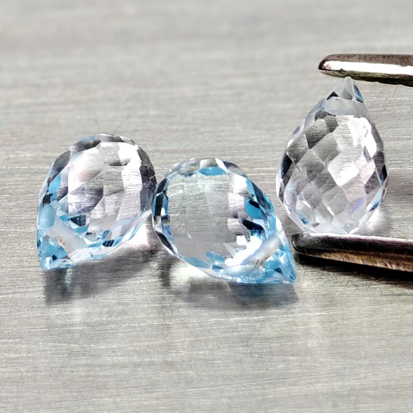 Natural Sky Blue Topaz 1.91 Ct. 3 Pcs. Briolette with Drilled Gemstones From Brazil: Product ID: 807168002 Product Name: Natural Blue Topaz Weight: 1.91 CT. Size: 5.8 x 3.8 x 3.8 to 5.7 x 3.8 x 3.8 MM. Shape: Briolette With Drilled Color: Sky Blue Clarity:VSI Luster: Good Gems Origin: