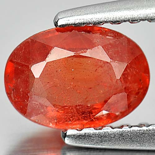 Natural Orange Sapphire 0.79 Ct. Oval Shape 6.8 x 4.9 Mm. Gemstone From Madagascar: Product ID: 806159640 Product Name: Natural Orange Sapphire Weight: 0.79 CT. Size: 6.8 x 4.9 x 2.6 MM. Shape: Oval Color: Orange Clarity:VSI Luster: Good Gems Origin: Madagascar Treatment: Heated Crys
