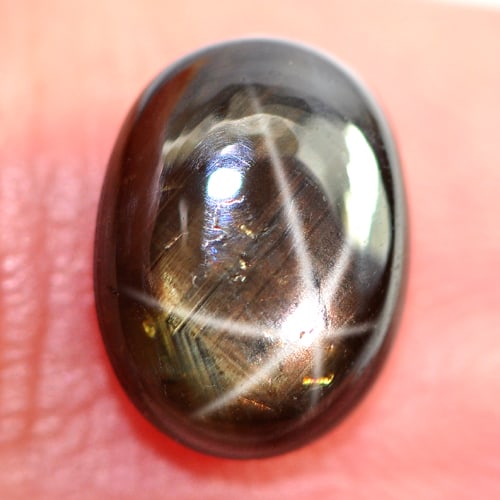 Natural Black Star Sapphire 6 Ray 1.75 Ct. Oval Cabochon Shape 8 x 6.1 Mm. Gemstone: Product ID: 806146164 Product Name: Natural Star Sapphire Weight: 1.75 CT. Size: 8 x 6.1 x 3.5 MM. Shape: Oval Cabochon Color: Black Clarity:Opaque Luster: Good 6 Rays Star Gems Origin: Thailand Treat