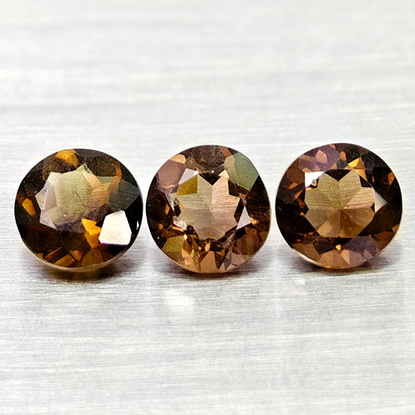 Natural Smokey Quartz 2.39 Ct. 3 Pcs Round Shape 6.1 Mm Gemstones From Brazil: Product ID: 805529920 Product Name: Natural Quartz Weight: 2.39 CT. Size: 6.1 x 6.1 x 3.8 MM. Shape: Round Color: Smokey Clarity:VSI Luster: Good Gems Origin: Brazil Treatment: Unheated Crystal Struct