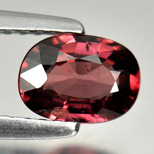 Natural Purplish Pink Rhodolite Garnet 0.89 Ct. VVS Oval Shape 7 x 5.1 Mm Gemstone From Madagascar: Product ID: 802925006 Product Name: Natural Rhodolite Weight: 0.89 CT. Size: 7 x 5.1 x 2.8 MM. Shape: Oval Color: Purplish Pink Clarity:VVS Luster: Good Gems Origin: Madagascar Treatment: Unheated Cry