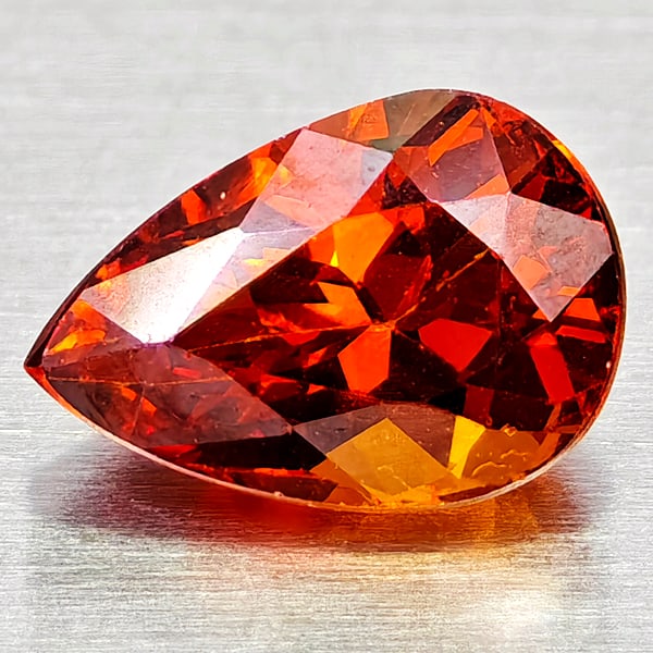 Natural Orangish Red Spessartine Garnet 0.98 Ct. Pear Shape 7.1 x 4.8 Mm Gemstone From Namibia: Product ID: 802936801 Product Name: Natural Spessartine Weight: 0.98 CT. Size: 7.1 x 4.8 x 3.7 MM. Shape: Pear Shape Color: Orangish Red Clarity:VSI Luster: Good Gems Origin: Namibia,Africa Treatment: