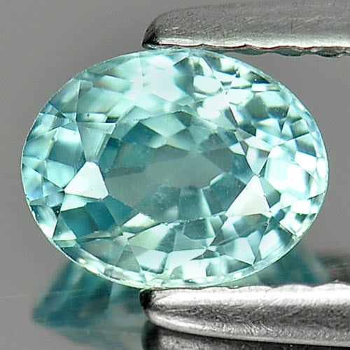 Natural Blue Zircon 1.18 Ct. Oval Shape Size 6.5 x 5.1 Mm. Gemstone from Cambodia: Product ID: 807724929 Product Name: Natural Zircon Weight: 1.18 CT. Size: 6.5 x 5.1 x 3.5 MM. Shape: Oval Color: Blue Clarity:VSI Luster: Good Gems Origin: Cambodia Treatment: Heated Crystal Structure