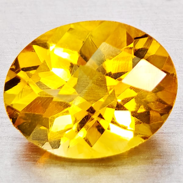 Natural Yellow Citrine 2.09 Ct. Oval Checkerboard Cut 10.1 x 8 Mm. Gemstone From Brazil: Product ID: 801815200 Product Name: Natural Citrine Weight: 2.09 CT. Size: 10.1 x 8 x 5.4 MM. Shape: Oval Checkerboard Cut Color: Yellow Clarity:VVS - VSI Luster: Good Gems Origin: Brazil Treatment: U