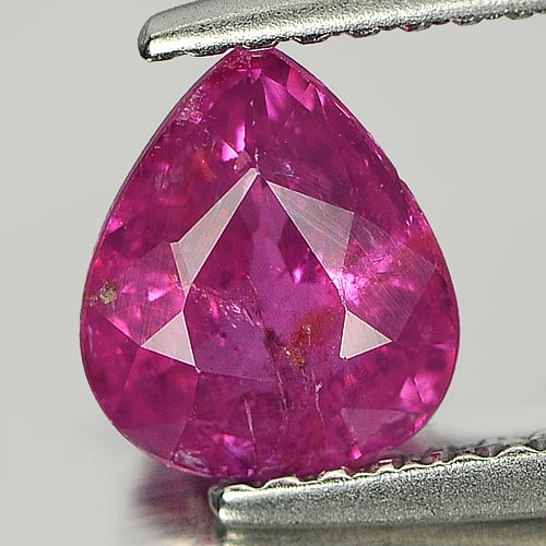 Natural Unheated Purplish Pink Sapphire 1.17 Ct. Pear Shape 7.19 x 6.18 Mm. Gemstone: Product ID: 805928845 Product Name: Natural Purple Sapphire Weight: 1.17 CT. Size: 7.19 x 6.18 x 3.39 MM. Shape: Pear Color: Purplish Pink Clarity:SI1 Luster: Good Gems Origin: Tanzania Treatment: Unh