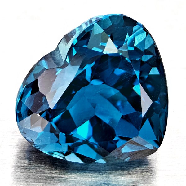 Natural London Blue Topaz 2.57 Ct. Heart Shape 8.1 x 7.5 Mm Gemstone From Brazil: Product ID: 807168351 Product Name: Natural Blue Topaz Weight: 2.57 CT. Size: 8.1 x 7.5 x 6.1 MM. Shape: Heart Shape Color: London Blue Clarity:VVS - VSI Luster: Good Gems Origin: Brazil Treatment: Tr