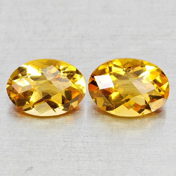 Natural Yellow Citrine 1.46 Ct. 2 Pcs Oval Checkerboard Cut 7 x 5 Mm Gemstones From Brazil: Product ID: 801815182 Product Name: Natural Citrine Weight: 1.46 CT. Size: 7 x 5 x 3.7 MM. Shape: Oval Checkerboard Cut Color: Yellow Clarity:VVS - VSI Luster: Good Gems Origin: Brazil Treatment: Unhe
