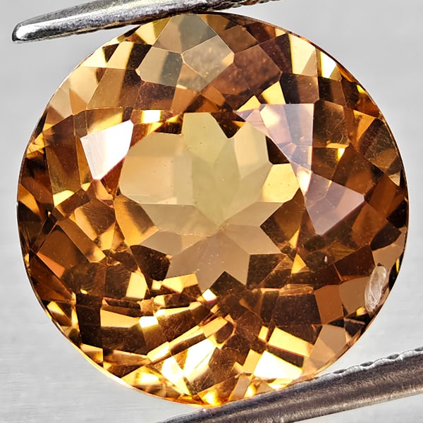 Natural Imperial Topaz 8.32 Ct. Round Shape 12 Mm. Gemstone From Brazil: Product ID: 807168097 Product Name: Natural Topaz Weight: 8.32 CT. Size: 12 x 12 x 8 MM. Shape: Round Color: Imperial Clarity:VSI Luster: Good Gems Origin: Brazil Treatment: Unheated Crystal Structure