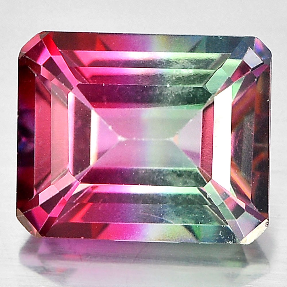 Natural Emerald Envy Pure Pink Topaz 6.21 Ct. VVS Octagon Shape 11.2 x 9.2 Mm. Gemstone From Brazil: Product ID: 827147907 Product Name: Natural Topaz Weight: 6.21 CT. Size: 11.2 x 9.2 x 5.6 MM. Shape: Octagon Color: Bi-Color Clarity:VVS Luster: Good Gems Origin: Brazil Treatment: Treated Crystal Str