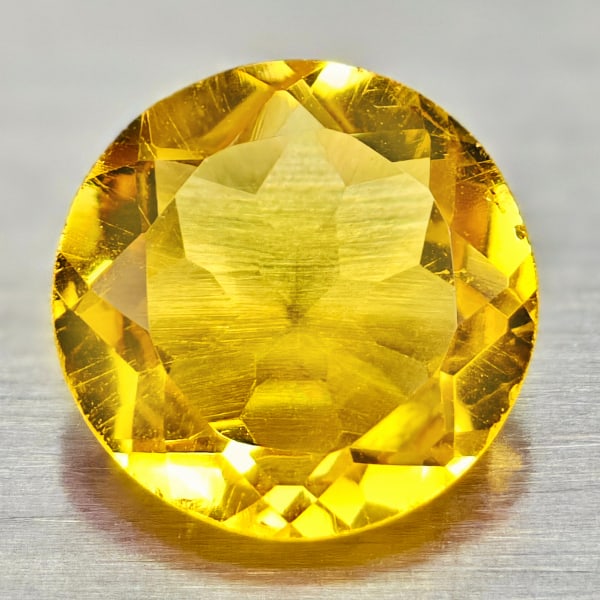 Natural Yellow Citrine 1.04 Ct. Round Shape 7 Mm. Gemstone From Brazil: Product ID: 801813560 Product Name: Natural Citrine Weight: 1.04 CT. Size: 7 x 7 x 3.5 MM. Shape: Round Color: yellow Clarity:VVS Luster: Good Gems Origin: Barzil Treatment: Unheated Crystal Structure