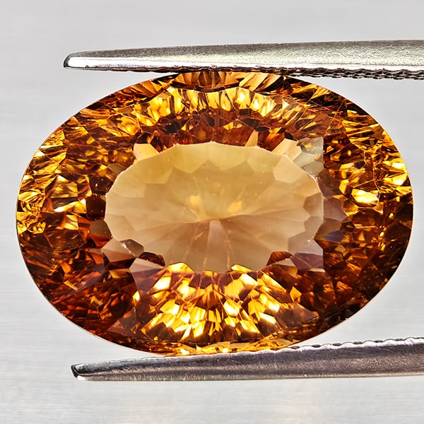Natural Imperial Topaz 13.34 Ct. Oval Concave Cut 16.3 x 11.8 Mm Gemstone From Brazil: Product ID: 807168286 Product Name: Natural Topaz Weight: 13.34 CT. Size: 16.3 x 11.8 x 9.1 MM. Shape: Oval Concave Color: Imperial Clarity:VSI Luster: Good Gems Origin: Brazil Treatment: Unheated Cry
